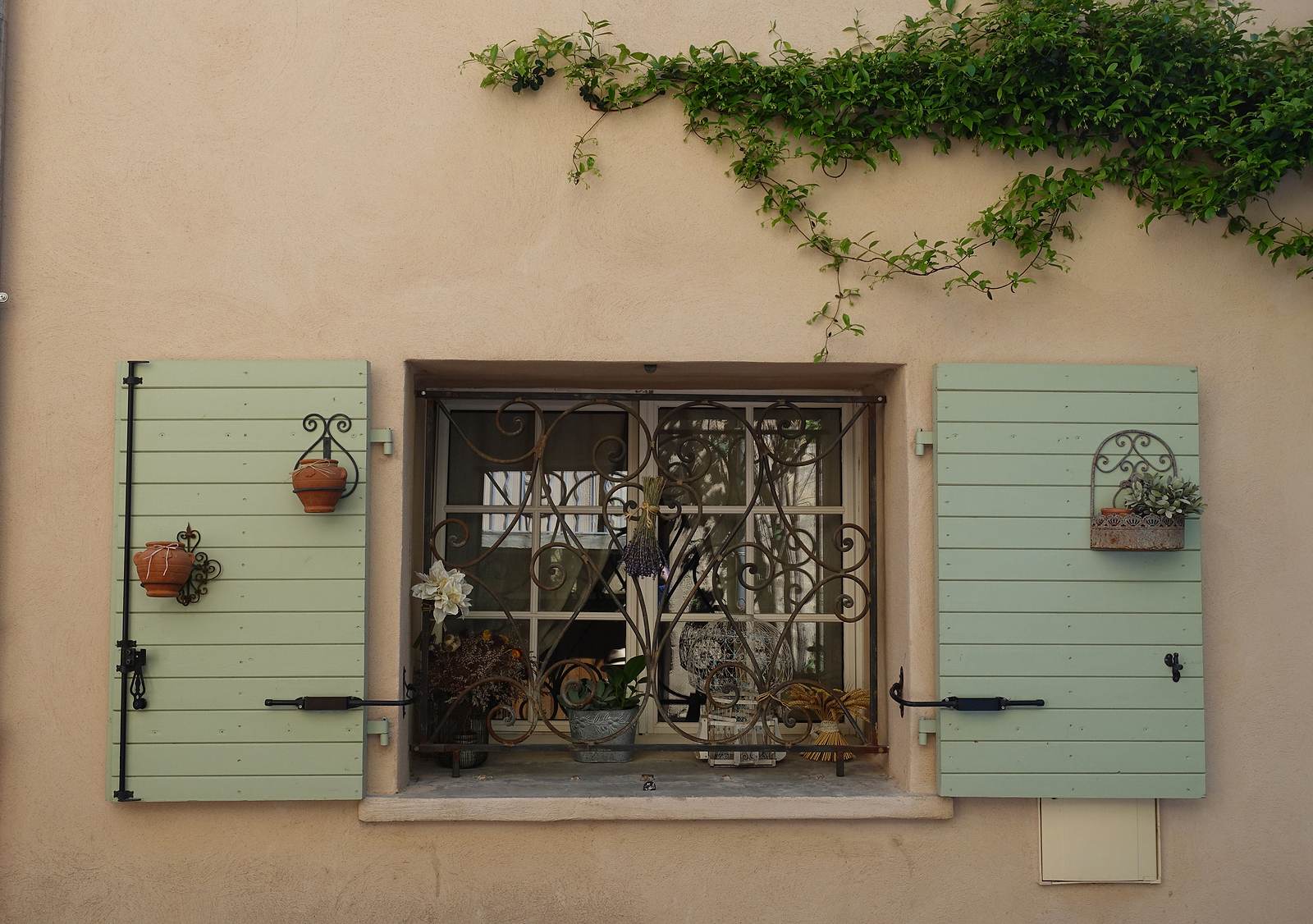 Window With Green Shutters And Window Pottery Box With Flowers