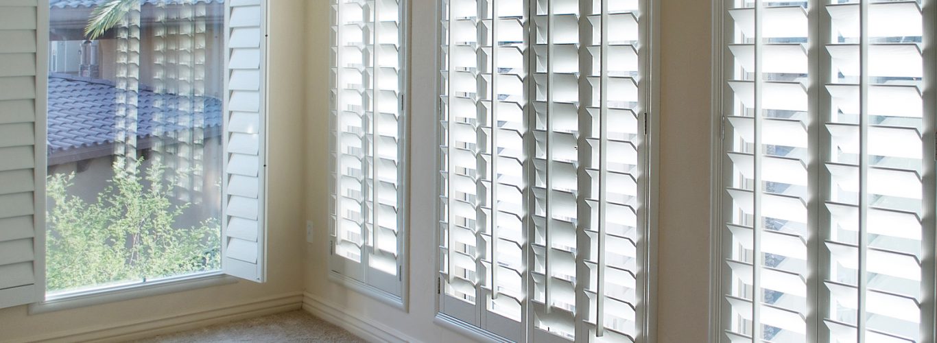 Full height window shutters - White plantation style wood Shutters