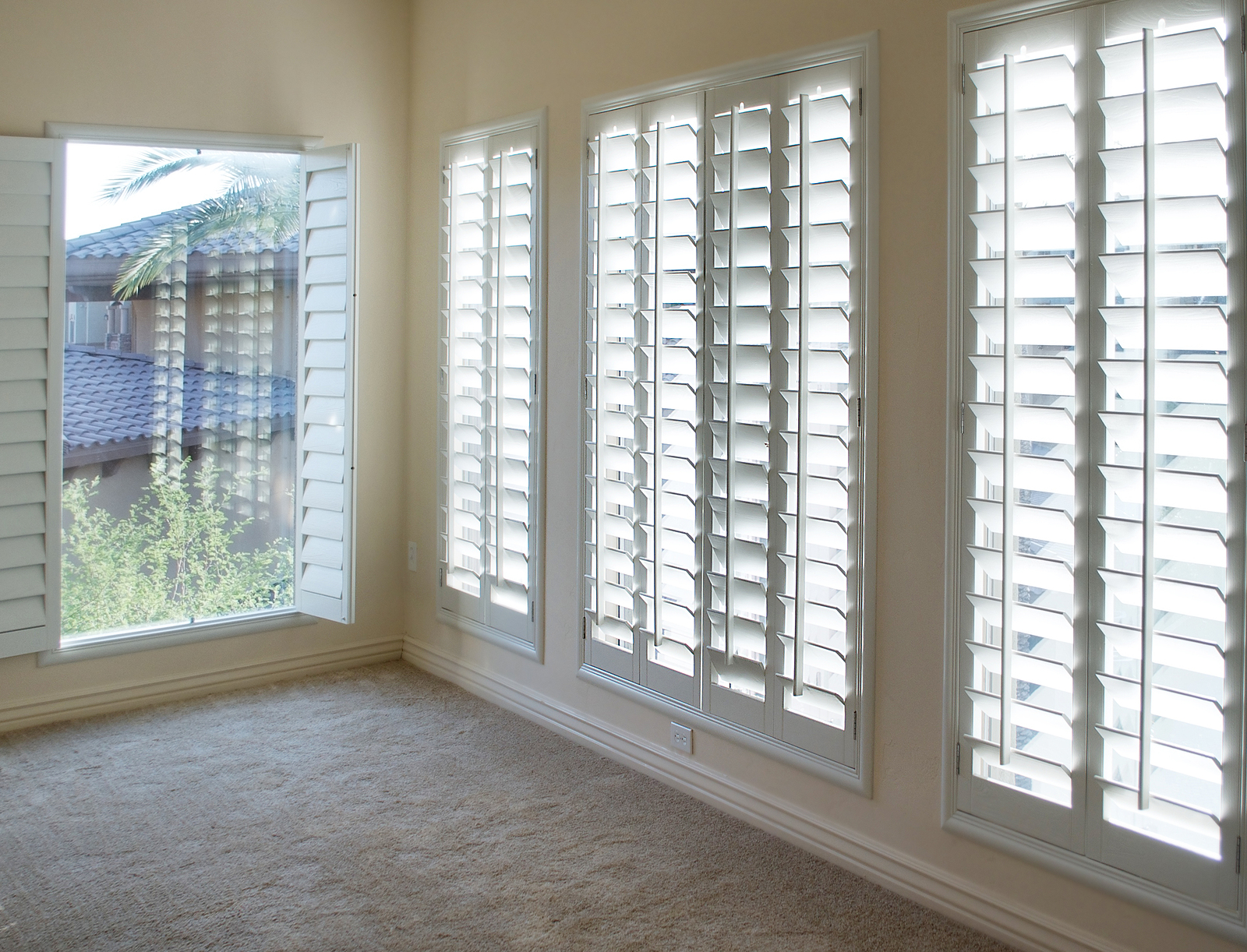 Full height window shutters - White plantation style wood Shutters