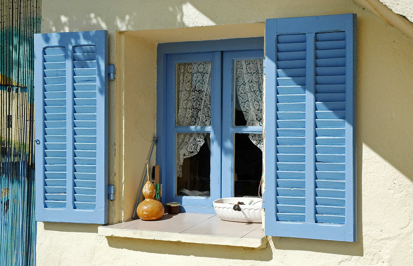 panel shutters - Opened blue window shutters