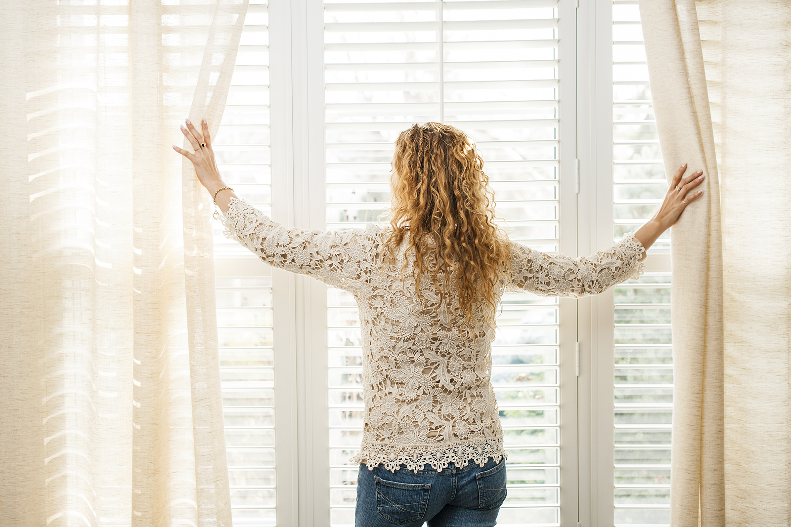 Full height shutter blinds Brighton - bright window with curtains and blinds