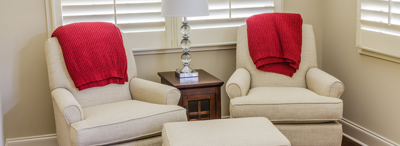plantation shutters horsham - Chairs with Red Throws in Sun Room