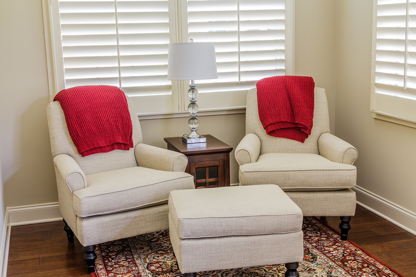 plantation shutters horsham - Chairs with Red Throws in Sun Room