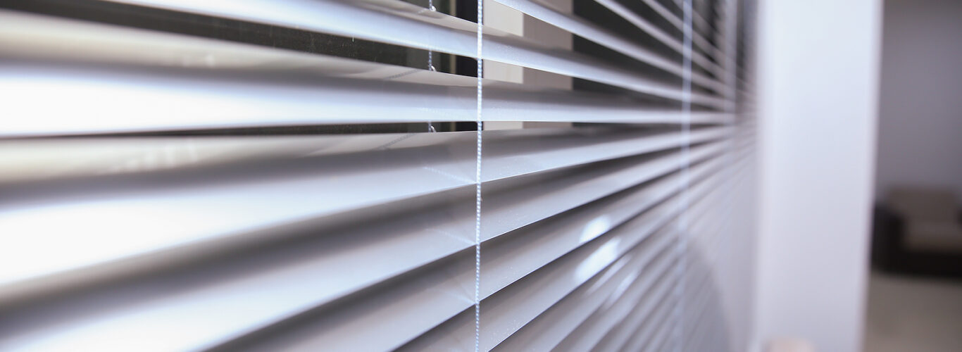 Shutters Brighton - Sunlight coming through venetian blinds