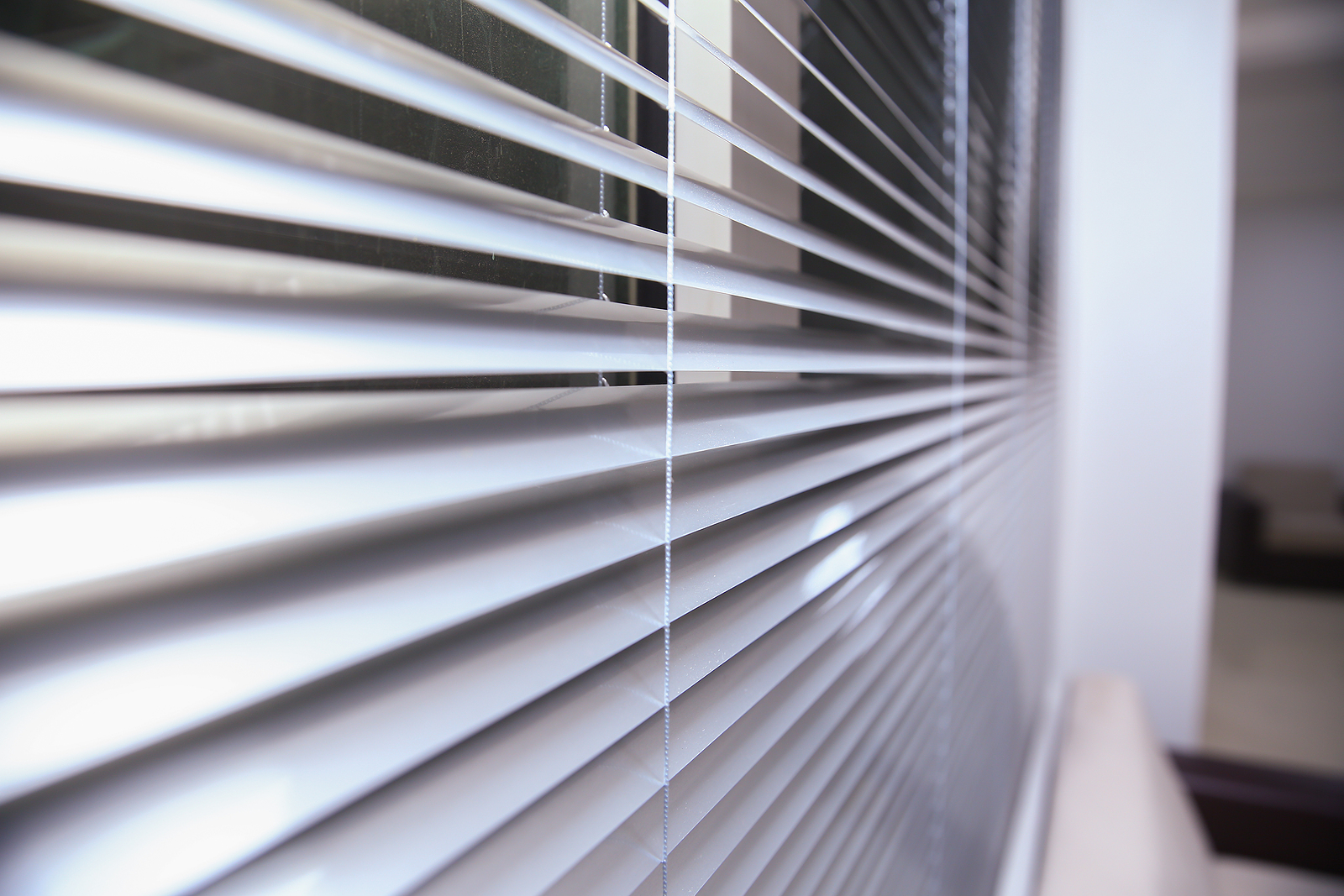 Shutters Brighton - Sunlight coming through venetian blinds