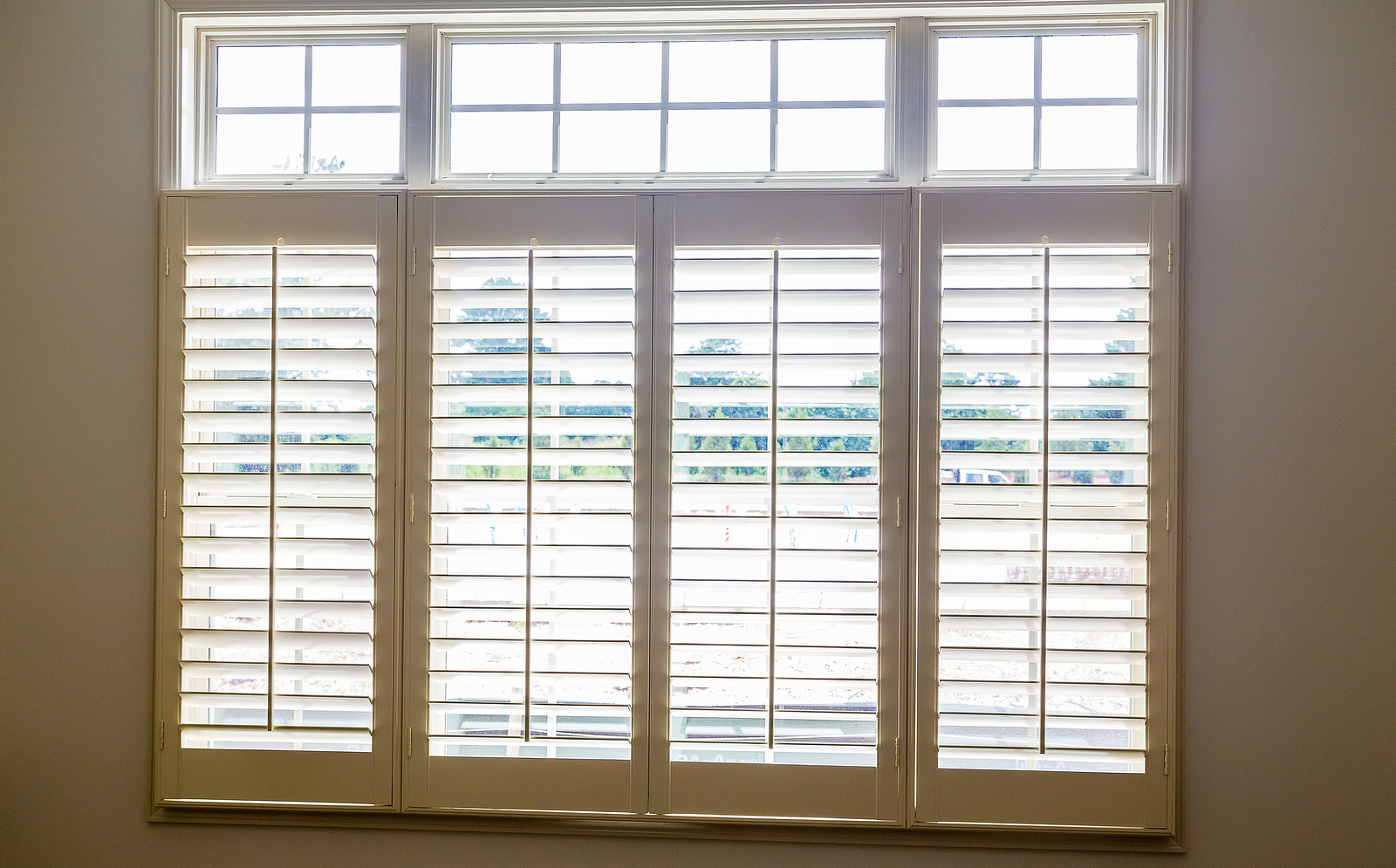 Full height shutters - White-Plantation-Shutters-In-A-Home